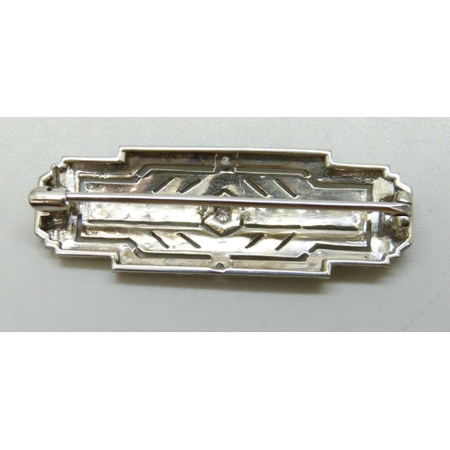 7215 - A white metal Art Deco diamond brooch, 4.9g, 4.3cm, boxed
