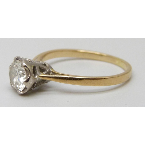 7216 - An 18ct gold diamond solitaire ring, over 0.5ct, 1.9g, L/M
