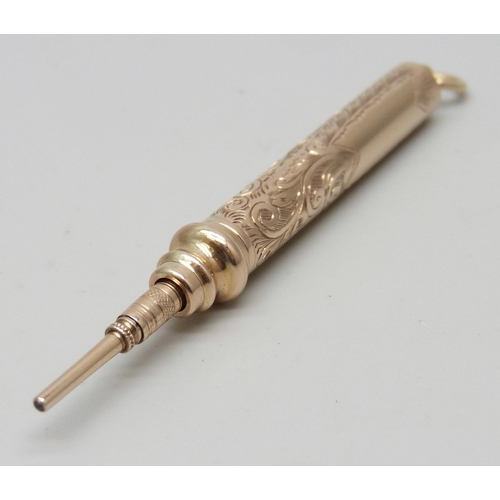 7253 - A 9ct gold propelling pencil, 9.4g, 7.2cm including loop, no personalisation
