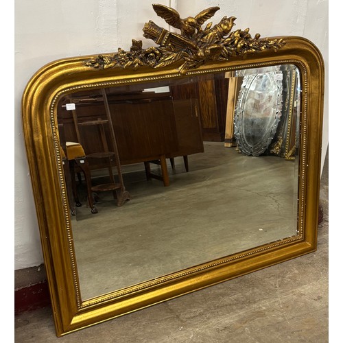 226 - A Victorian style gilt framed overmantel mirror
