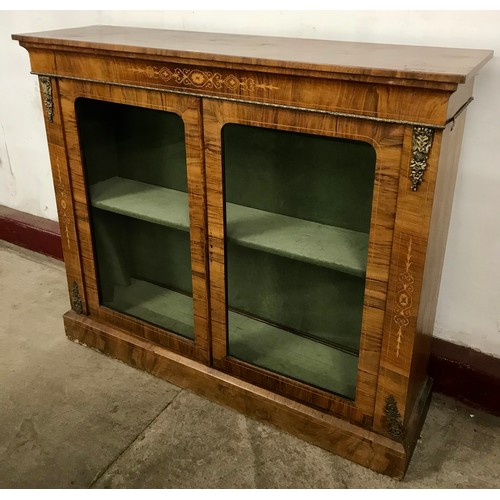 89 - A Victorian inlaid walnut and gilt metal mounted bookcase