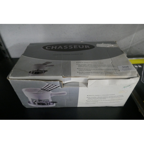 5125 - An assortment of items including, keyboard, headphones, screen protectors, ceramic fondue set, etc