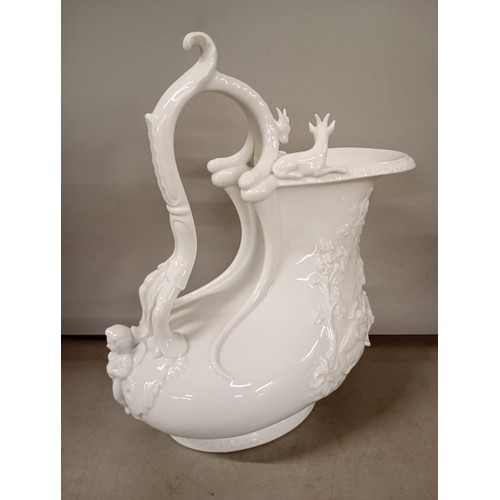 2315 - A Capodimonte Richard Ginori parian ware porcelain jug with high relief decoration of goats and cher... 
