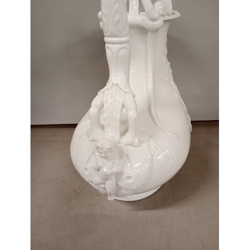 2315 - A Capodimonte Richard Ginori parian ware porcelain jug with high relief decoration of goats and cher... 