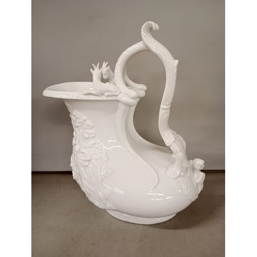 2315 - A Capodimonte Richard Ginori parian ware porcelain jug with high relief decoration of goats and cher... 