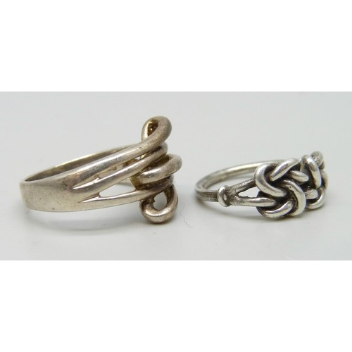 7059 - Two silver rings including Modernist style, knot example J/K, the other Q
