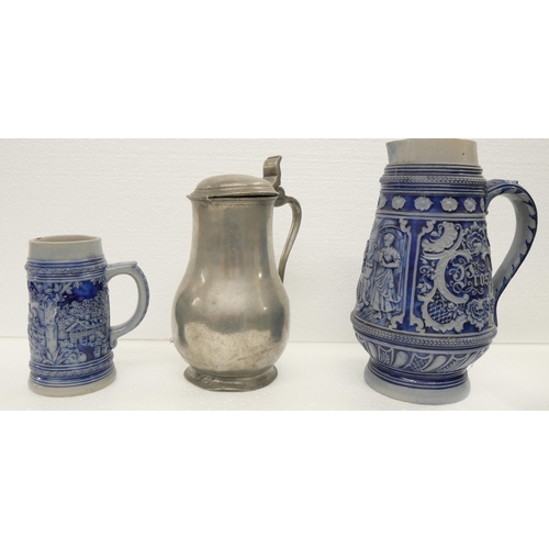 2351 - A German stoneware two litre jug, beer stein and pewter jug