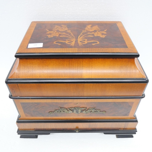 2369A - A Regency style inlaid burr walnut table-top drinks cabinet having an arrangement of decanters and l... 