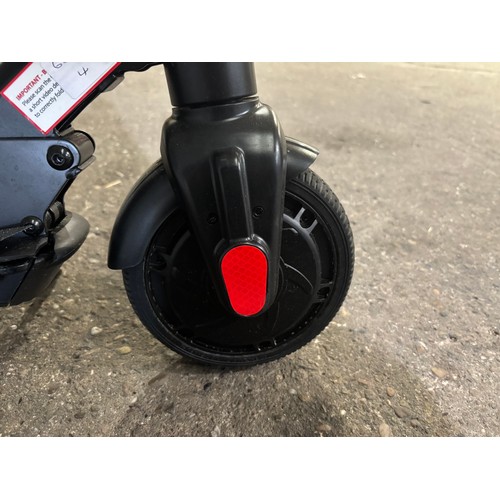 6110 - A Life 200 black and green electric scooter with charging lead