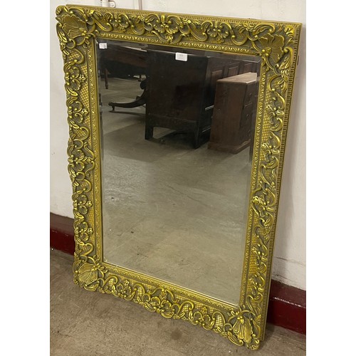 222 - A French Rococo style gilt framed mirror