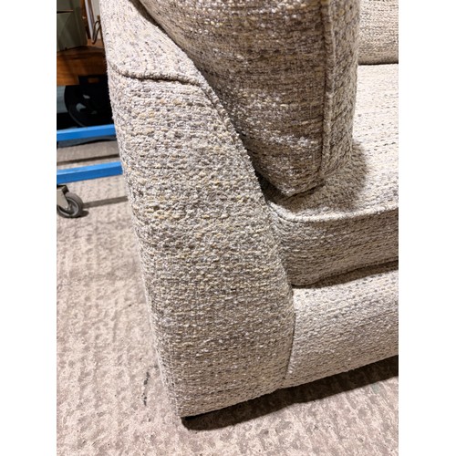 3225 - A beige fleck love seat