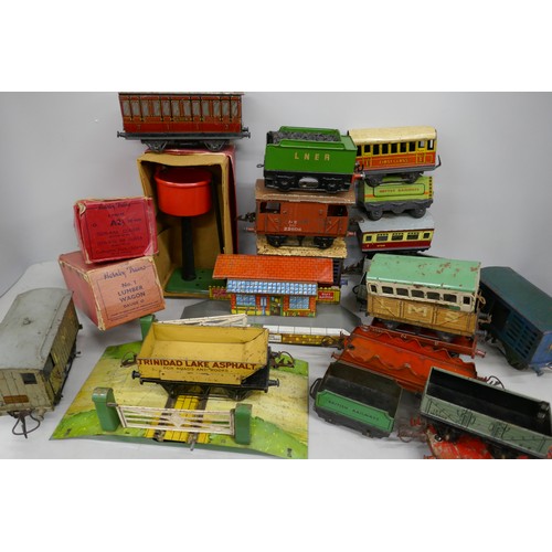 2196 - A collection of Hornby 0 gauge model railway, to include, wagons, coaches, etc., some boxed