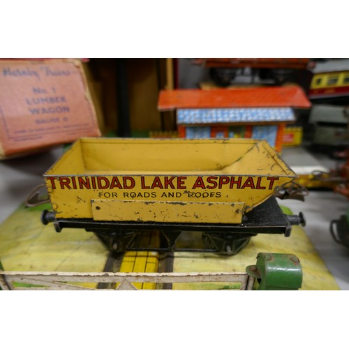 2196 - A collection of Hornby 0 gauge model railway, to include, wagons, coaches, etc., some boxed