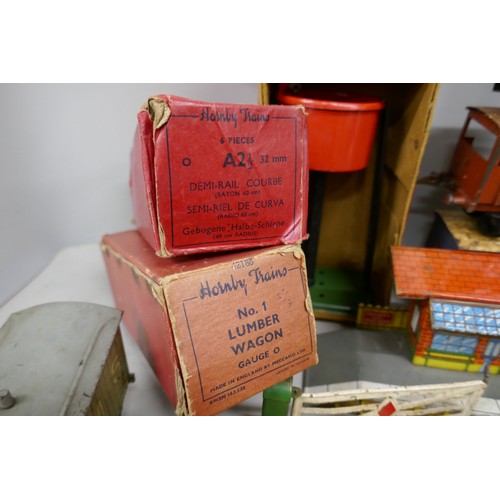 2196 - A collection of Hornby 0 gauge model railway, to include, wagons, coaches, etc., some boxed