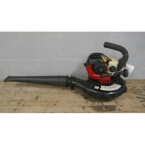 5036 - A JCB CS38 petrol driven chainsaw and a Homelite Mighty-lite petrol driven leaf blower