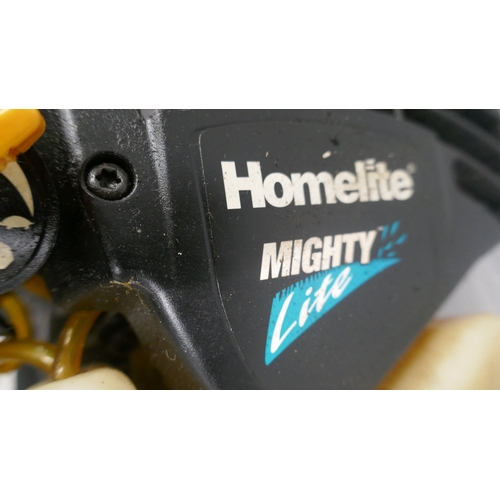 5036 - A JCB CS38 petrol driven chainsaw and a Homelite Mighty-lite petrol driven leaf blower