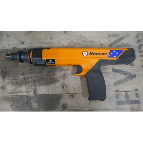 A cased Ramset TS750P powder actuated tool set with drive pins, wire ...