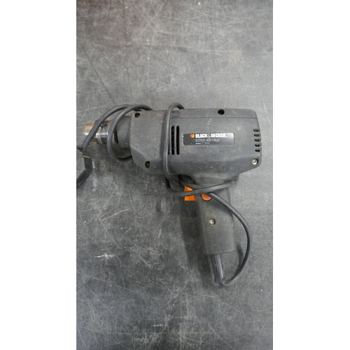 5054 - A bag of assorted power tools including Black and Decker drill, drill sharpener, polisher, etc** Bla... 