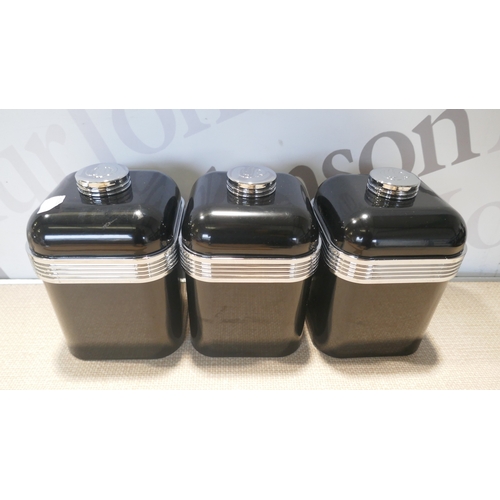 6057 - A Chopping board and rolling pin, set of 3 tea and coffee storage containers, metal cake stand, 2 po... 