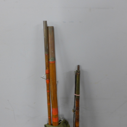 5256 - Two fishing rods (one 3 piece) and a reel
