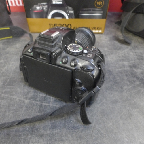 A boxed D5300 AF-P digital SLR camera body with a Nikon DX-VR AFP ...