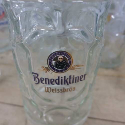 5171 - Eight large drinking glasses including Erdinger, Beneiktiner, Bitburger, etc.