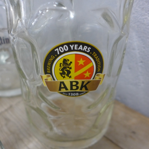 5171 - Eight large drinking glasses including Erdinger, Beneiktiner, Bitburger, etc.