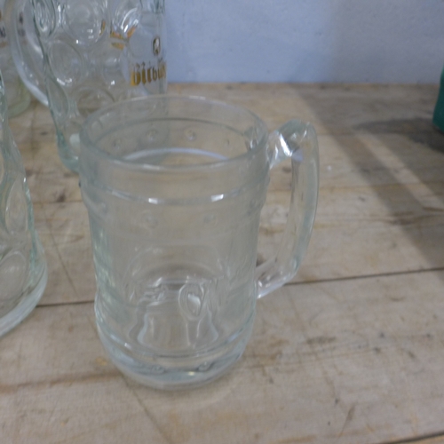 5171 - Eight large drinking glasses including Erdinger, Beneiktiner, Bitburger, etc.