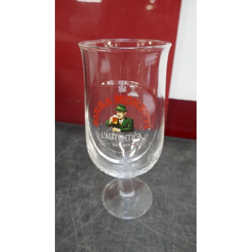 5147 - Twenty seven Birra Moretti glasses