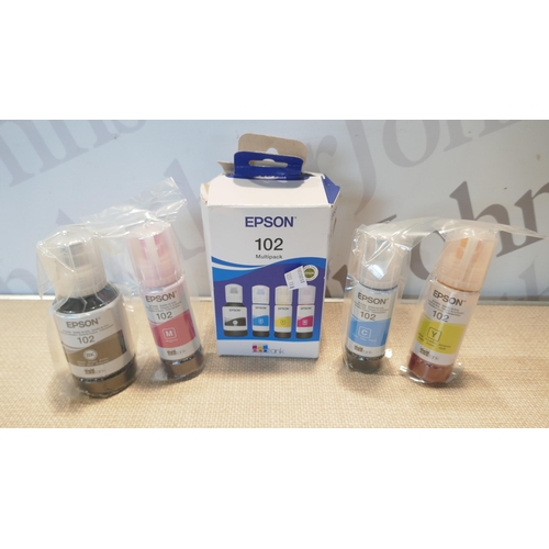 6116 - An Epson 102 mulit-pack ink and four Pixma 545 black ink cartridges  * This lot is subject to VAT