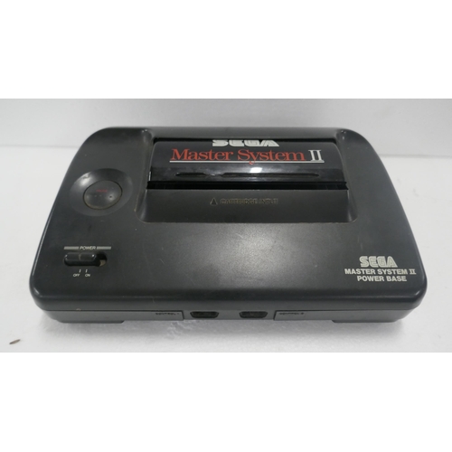 A Sega Master System II games console with a Sega Master System control ...