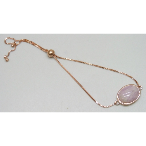 7163 - A 11.35ct kunzite oval silver rose gold gilt bracelet (16 x 12mm), adjustable