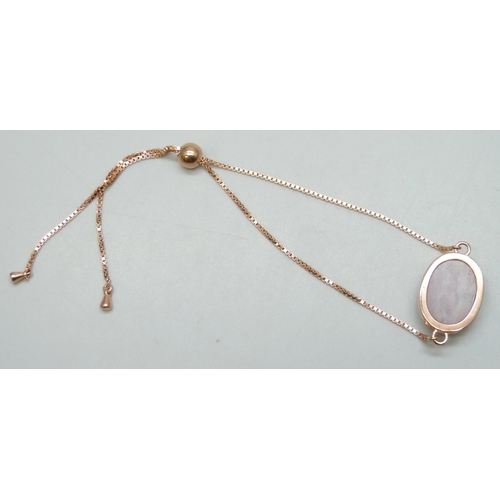 7163 - A 11.35ct kunzite oval silver rose gold gilt bracelet (16 x 12mm), adjustable