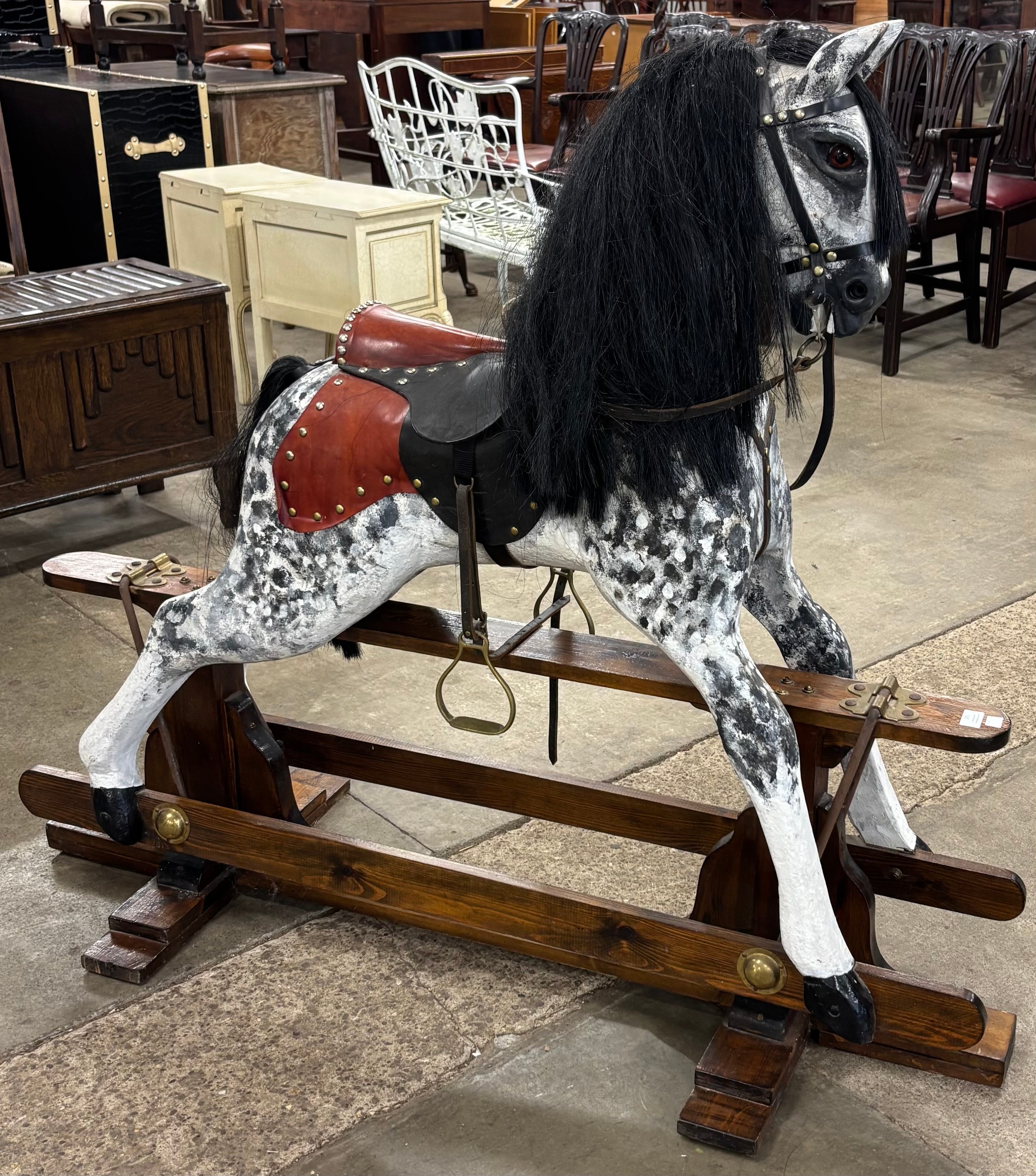 A Victorian style dapple grey rocking horse