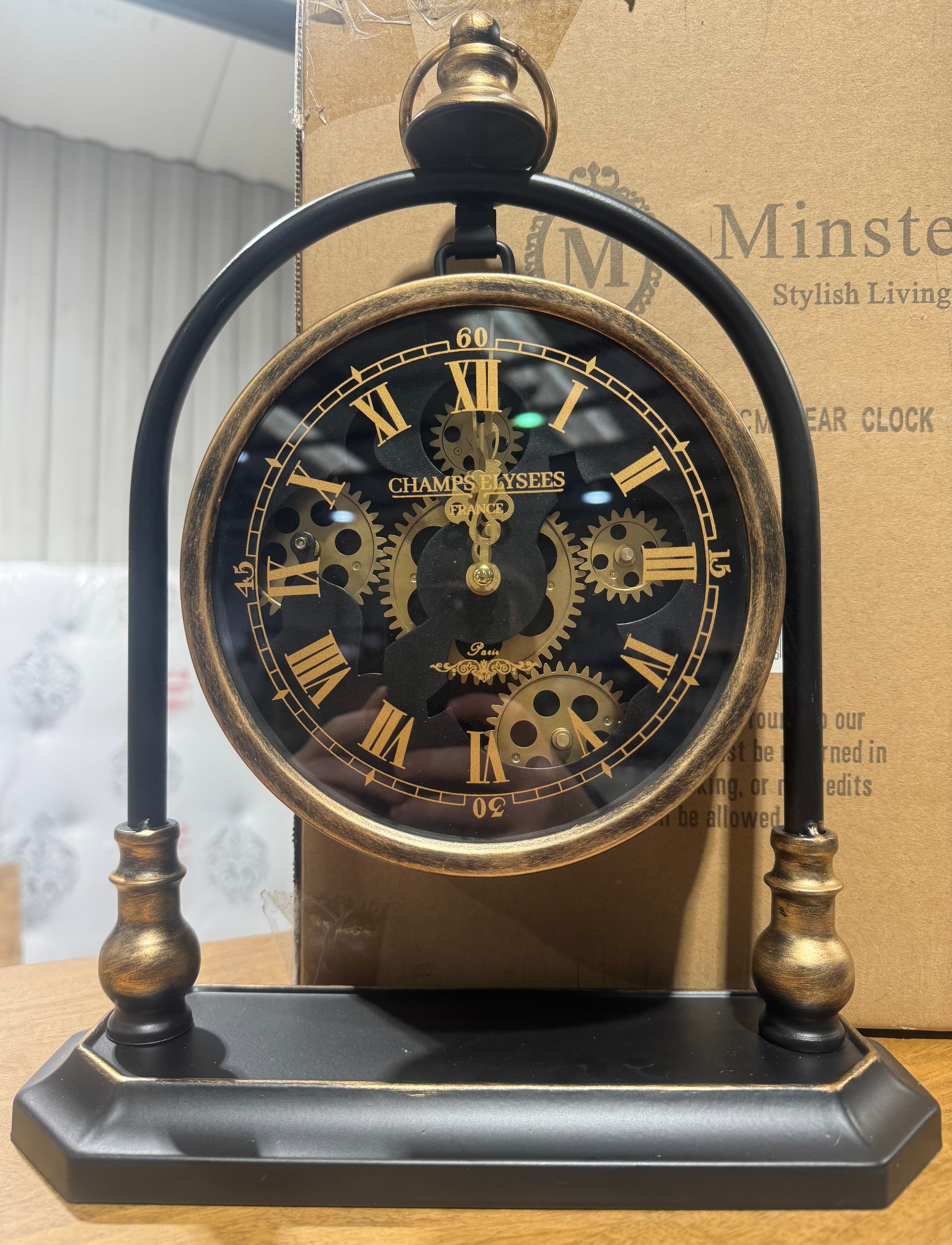 A small table top moving gear clock (display)