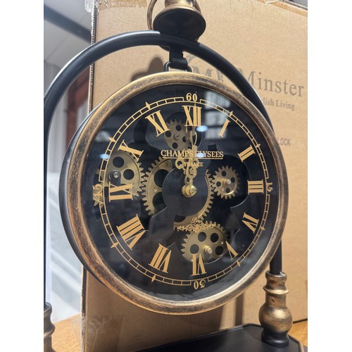 A small table top moving gear clock (display)