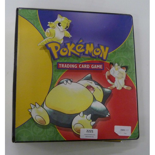 A vintage wizards of the coast Pokemon card binder, containing 300 cards  including 4th print, holofo