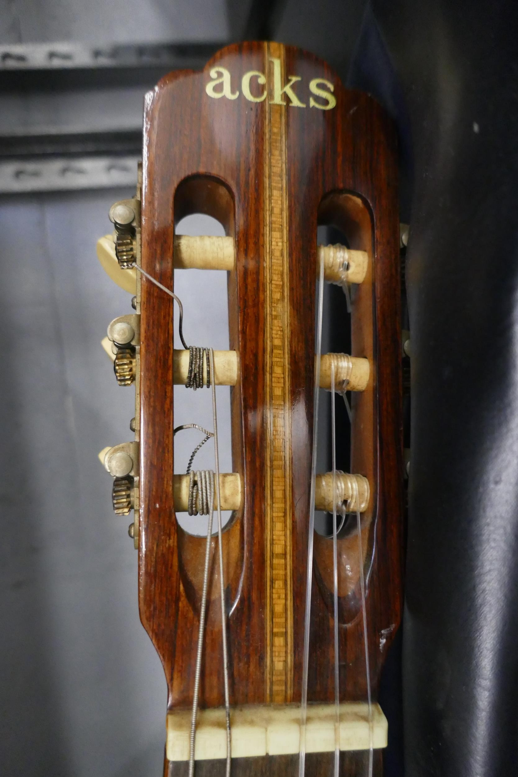 An Acks model No.70 Kiso Suzuki Violin Co. Ltd. acoustic guitar with case