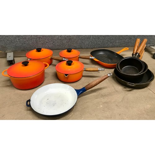 Assorted Le Creuset cast iron Volcanic orange cookware and another set ...