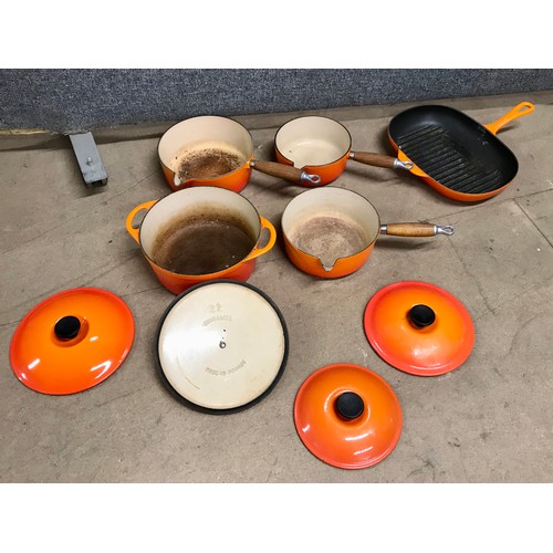 Assorted Le Creuset cast iron Volcanic orange cookware and another set ...