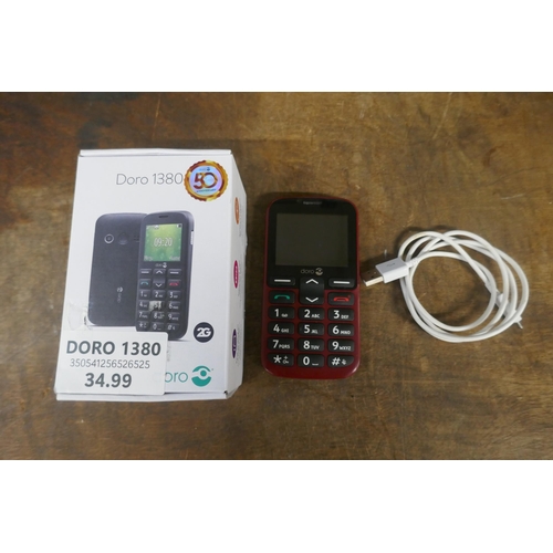 5002 - A Doro 1380 mobile phone, boxed with charging cable