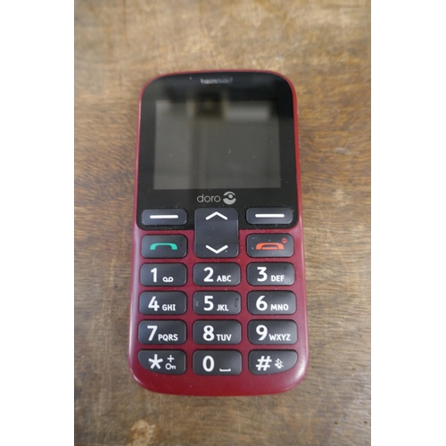5002 - A Doro 1380 mobile phone, boxed with charging cable