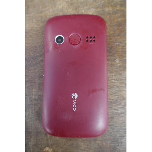 5002 - A Doro 1380 mobile phone, boxed with charging cable