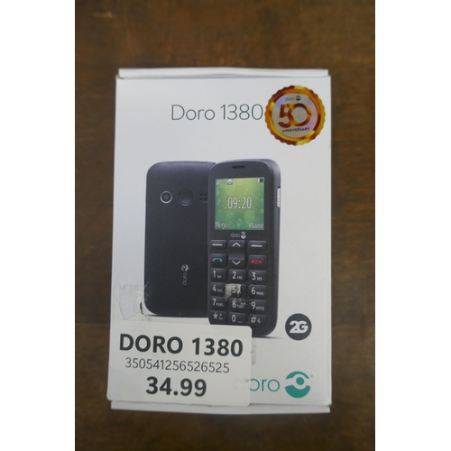 5002 - A Doro 1380 mobile phone, boxed with charging cable