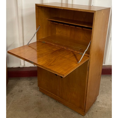 18 - A Gordon Russell, Broadway Ltd. walnut and ebony cocktail cabinet