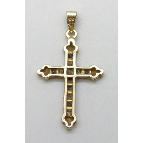 7009 - A 9ct gold cross pendant set with diamonds and sapphires, 1.5g, 3cm including bail