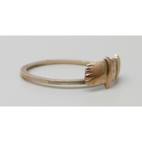 7013 - A ring with applied yellow metal plaque, a/f, 1.2g