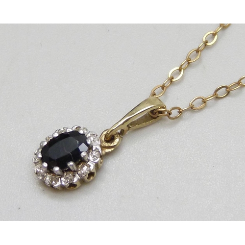7039 - A 9ct gold, sapphire and diamond cluster pendant on a 9ct gold necklace chain (repair to clasp), 1.9... 
