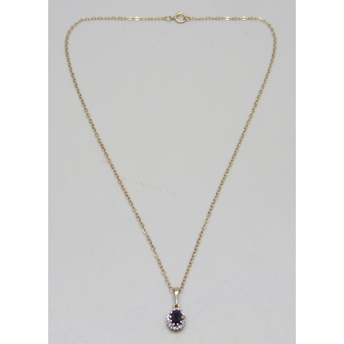 7039 - A 9ct gold, sapphire and diamond cluster pendant on a 9ct gold necklace chain (repair to clasp), 1.9... 