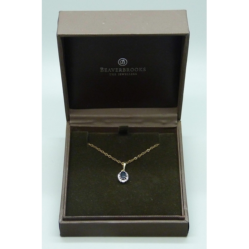 7039 - A 9ct gold, sapphire and diamond cluster pendant on a 9ct gold necklace chain (repair to clasp), 1.9... 